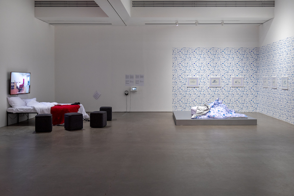 Installation view of the 2024 group exhibition De la vie au lit at Galerie de l'UQAM in Montreal.